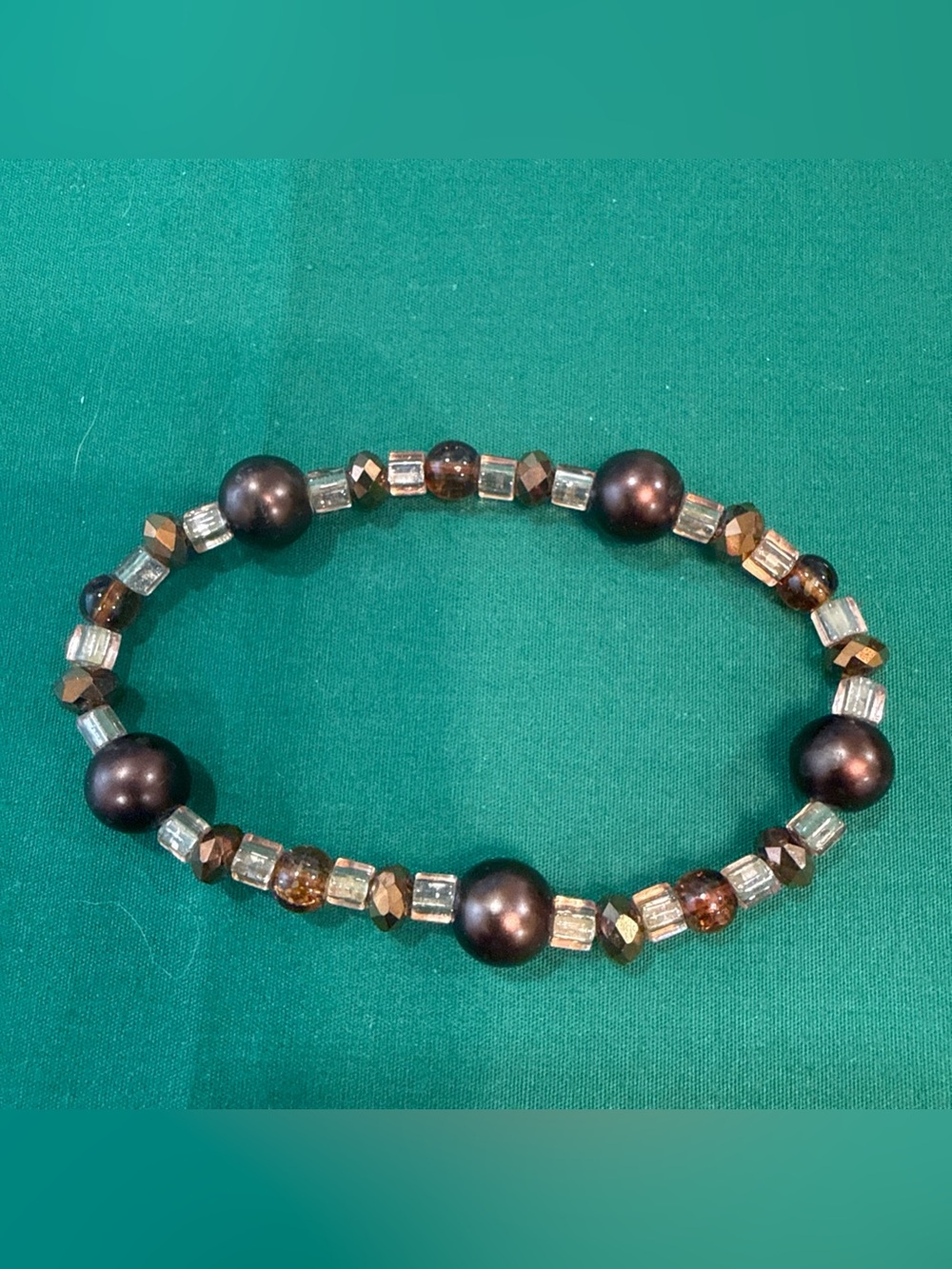 Stretch Bracelet With Dk Brown,Amber & Metallic Colored Beads. 55F